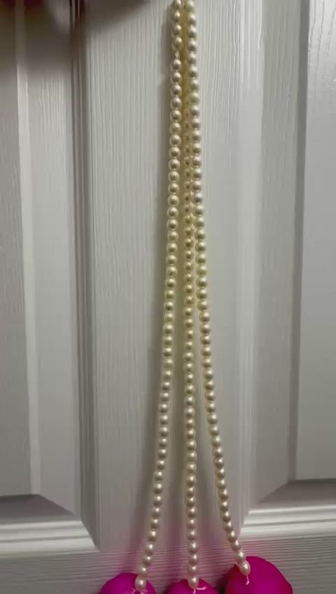 Pearl strings with lotus