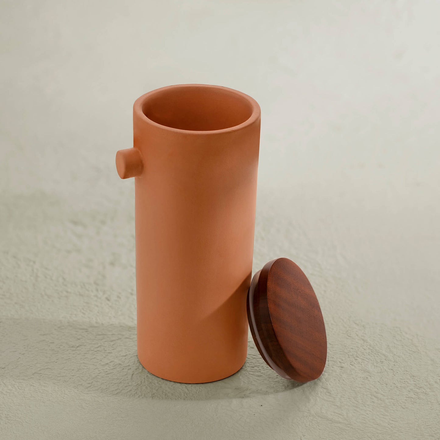 Terracotta carafe with wooden lid